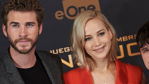 De izq. a der., los actores Liam Hemsworth,  Jennifer Lawrence y Josh Hutcherson en plena promoción de "The Hunger Games".