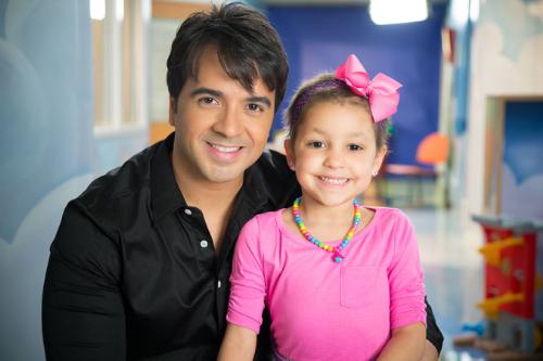 Con Izarah, paciente de St. Jude.