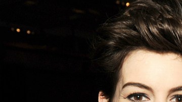 Actress Anne Hathaway (L) and actor Adam Shulman