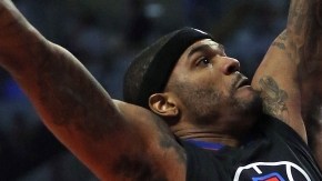 Jimmy Butler entraba frente a Josh Smith de Los Angeles Clippers.