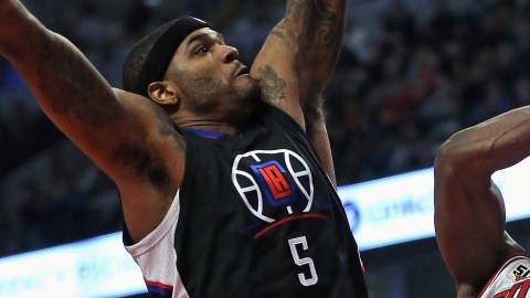 Jimmy Butler entraba frente a Josh Smith de Los Angeles Clippers.
