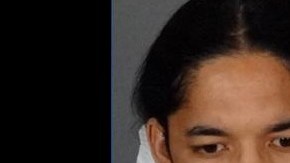 Michael Charles Parker, de 31 años, es acusado de acuchillar a un cliente.
