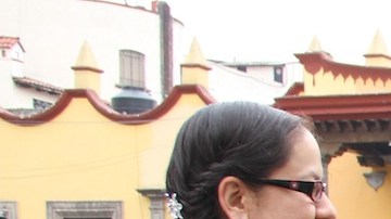 Una familia disfruta de la tamaliza en la Feria