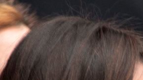 Michelle y Barack Obama, junto a Raúl Castro en el Estadio Latinoamericano de La Habana.