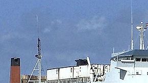 A Havana resident watches as the Express