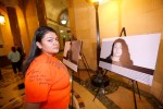 Yamilex Rustrian, de 20 años, una beneficiaria de DACA es uno de los rostros que aparecen en una exhibición que busca atraer atención a aquellos que se benefician con los programas impulsados por el presidente Obama. (Foto: Aurelia Ventura/ La Opinion)