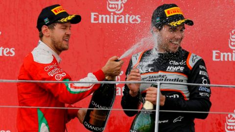 Sebastian Vettel y Checo Pérez, segundo y tercer lugar en Baku.