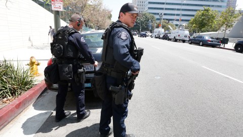 07/08/16/LOS ANGELES/LAPD officers and members of SWAT leave LAPD headquarters after a graduation ceremony for new recruits in Los Angeles. LAPD officers have been instructed to patrol in pairs after the aftermath of the deadly shootings of police officers in Dallas. (Photo Aurelia Ventura/ La Opinion)