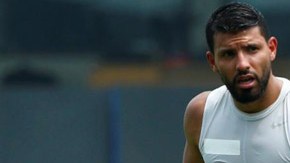 Sergio Agüero y Pep Guardiola