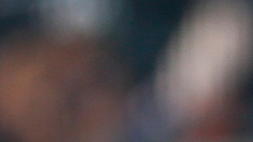 Brandon Nimmo, de los Mets, barre fuerte en la segunda base sobre Adeiny Hechavarría, de los Marlins.