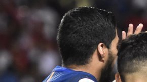 Messi festejando con sus compañeros la victoria ante el Sevilla en la Supercopa de España.