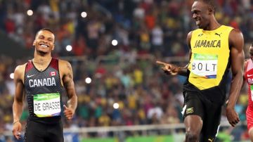 Un momento para la posteridad: De Grasse y Bolt, en un gesto inolvidable. Una de las mejores fotos de Río 2016, sin duda.