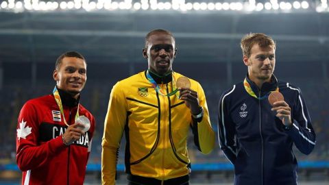 De Grasse, Bolt y Lemaitre en el podio de los 200 m.