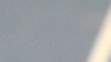 De Grasse  y Bolt durante la recta final de la semifinal de los 200 m.