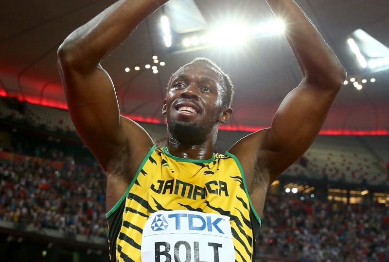 BEIJING, CHINA - AUGUST 29: Usain Bolt of Jamaica crosses the finish line to win gold in the Men's 4x100 Metres Relay final during day eight of the 15th IAAF World Athletics Championships Beijing 2015 at Beijing National Stadium on August 29, 2015 in Beijing, China. (Photo by Cameron Spencer/Getty Images)