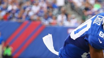 Víctor Cruz en la jugada con Ken Krawley en la que casi se definió el partido entre Giants y Saints.