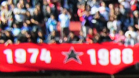 Messi en la cancha de Newell's en un partido de beneficencia.