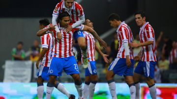 Chivas festeja el tercer gol en el último enfrentamiento ante el América.