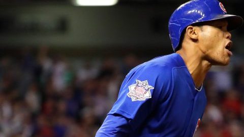 Addison Russell reacciona tras conectar un jonrón con las bases llenas en la tercera entrada, el batazo más importante del sexto juego de la Serie Mundial, ganado por Chicago por paliza.