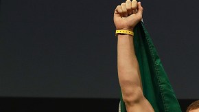 NEW YORK, NY - NOVEMBER 11:  UFC Featherweight Champion Conor McGregor reacts as he walks on stage for  UFC 205 Weigh-ins at Madison Square Garden on November 11, 2016 in New York City.  (Photo by Michael Reaves/Getty Images)