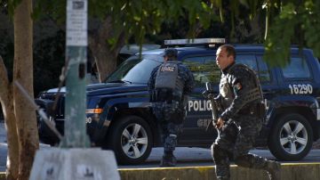 Las fuerzas de seguridad se desplegaron para contener la situación tras los tiroteos en varios puntos de Cancún. EFE