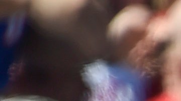 Angel Pagan #16 de Puerto Rico es felicitado tras anotar en el primer inning.