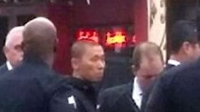 A la extrema derecha, el policía Clifford Proctor.