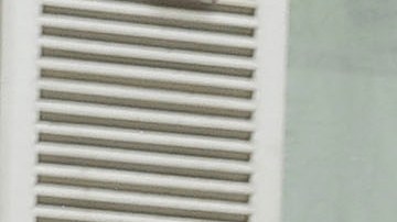 Bella Hadid Flashes her Perfect Tan & Abs in Tiny Bra & Snake Jacket