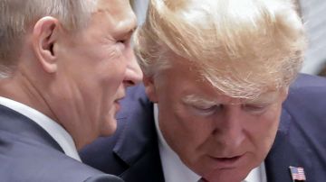 El presidente Trump y el mandatario Putin en reunión de la APEC.