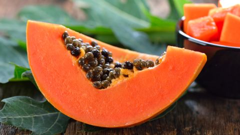 papaya slice on wood