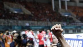 El jugador surcoreano Son Heung Min celebra el triunfo de su selección en los Juegos Asiáticos. (Foto: EFE/EPA/MAST IRHAM)