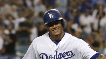 Los Angeles Dodgers buscan ante Colorado la corona de la división oeste de la Liga Nacional. (Foto: EFE/EPA/MIKE NELSON)