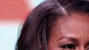 Michelle Obama (izq) y Karin Housley, candidata republicana. Getty Images