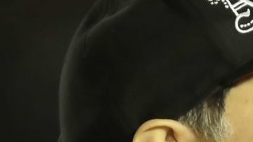 Diego Armando Maradona, director técnico de Dorados... y uno de sus relojes.