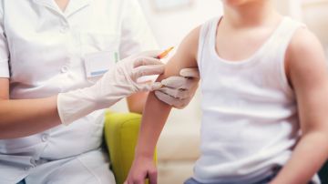 Padres vacuna influenza niños