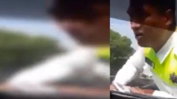 Policía arrollado