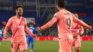Messi y Suárez celebran el triunfo del FC Barcelona ante el Getafe.