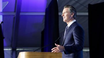 SACRAMENTO, CA - JANUARY 07: Governor Gavin Newsom delivers his inaugural address as his son Dutch, 2, walks on stage on January 7, 2019 in Sacramento, California. Gavin Newsom will begin his first term after serving as the 42nd Mayor of San Francisco as well as Lieutenant Governor of California since 2010 alongside outgoing governor Jerry Brown