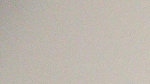 Un visitante fotografía cerca de la obra de arte 'The Door (Oficina de Admisiones)' de David Hammons, parte de la exposición 'Alma de una nación: El arte en la era del poder negro 1963-1983'. (EFE/ Eugene García)