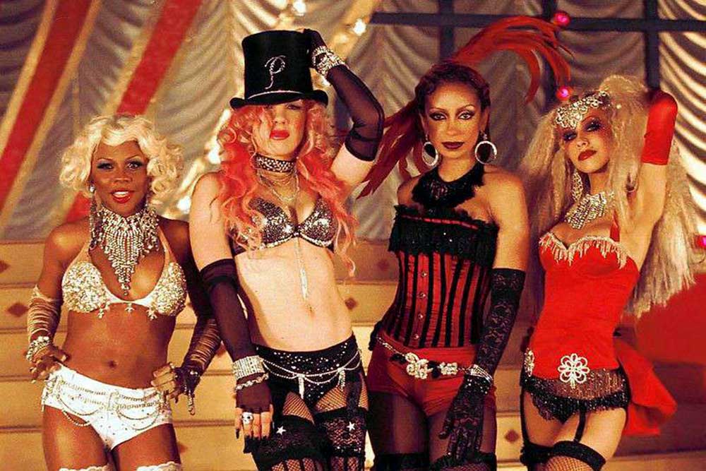 Christina Aguilera, Lil’ Kim, Mya y Pink. 