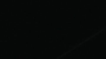 NEW YORK, NEW YORK - JUNE 23: People watch as Nik Wallenda and Lijana Wallenda cross Times Square on a high wire strung between two skyscrapers 25 stories above the pavement on June 23, 2019 in New York City. The two siblings from the famed Flying Wallendas safely crossed the span while thousands watched from below. This was the first professional appearance for Lijana Wallenda since her near-fatal accident in 2017 when she broke nearly every bone in her face. (Photo by Spencer Platt/Getty Images)