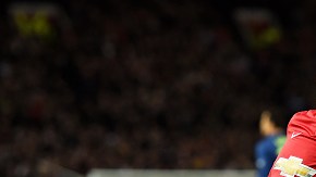 MANCHESTER, ENGLAND - MARCH 09:  Wayne Rooney of Manchester United celebrates after scoring a goal to level the scores at 1-1 during the FA Cup Quarter Final match between Manchester United and Arsenal at Old Trafford on March 9, 2015 in Manchester, England.  (Photo by Laurence Griffiths/Getty Images)