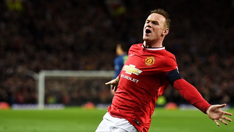 MANCHESTER, ENGLAND - MARCH 09:  Wayne Rooney of Manchester United celebrates after scoring a goal to level the scores at 1-1 during the FA Cup Quarter Final match between Manchester United and Arsenal at Old Trafford on March 9, 2015 in Manchester, England.  (Photo by Laurence Griffiths/Getty Images)