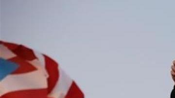 Los cantantes puertorriqueños (i-d) Ricky Martin, Tommy Torres, Bad Bunny y Residente participan en una manifestación masiva este miércoles, en contra el Gobernador de Puerto Rico.