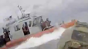 Los Guardacostas estadounidenses deteniendo a un sumbarino.