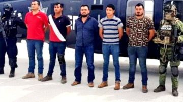 "El 20" (camisa azul al centro) fue detenido en marzo en una finca en Jalisco.