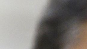 Ishmael Bailey (derecha) junto a Emma Coronel al salir de la Corte el 17 de julio