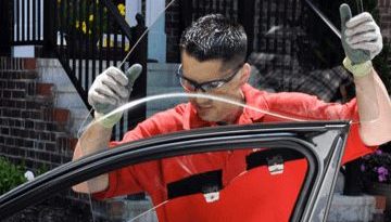 technician-car-window-desktop@2x5e2c821a95e46d49847aff010014aa5a