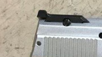 El arma que portaba el occiso