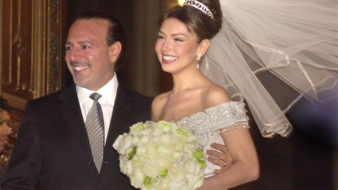 Tommy Mottola y Thalía.